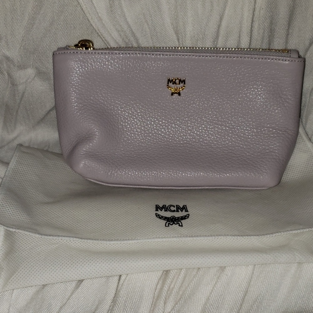 MCM small cosmetic bag price is firm